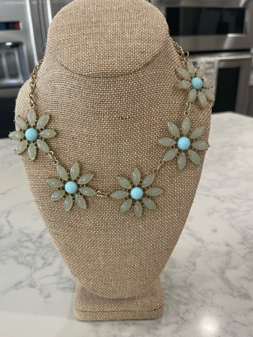 Gold-Tone Floral Necklace with Light Blue and Pale Green Petals